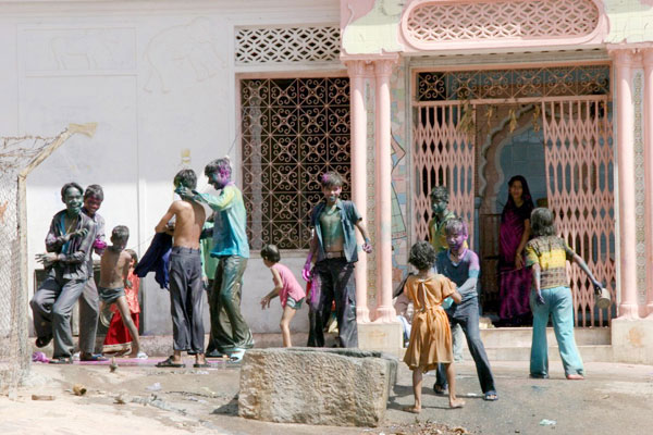 village-children-playing-with-colours-in-colour-festival-holi-233